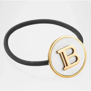 Λαστιχάκι μαλλιών με λογότυπο "B" BALMAIN Limited Edition Legacy Elastique Λαστιχάκι μαλλιών με λογότυπο "B" BALMAIN Limited Edition Legacy Elastique